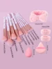 The 17PCS makeup brush set includes a multi-functional makeup set brush, a sponge egg powder puff, and a hair band/wrist strap