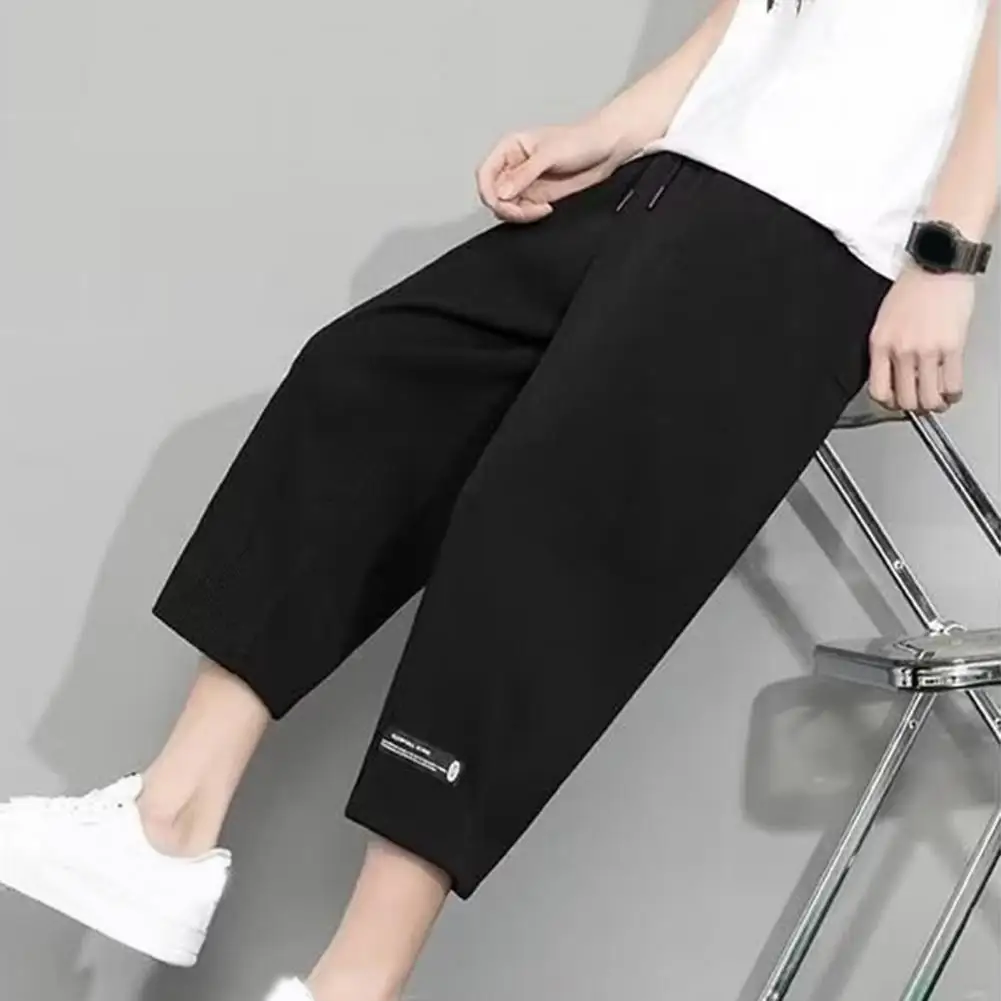 

Men Pants Ice Silk Thin Loose Mid-calf Length Drawstring Elastic Waist Quick Dry Soft Breathable Pockets Solid Color Cropped Tro