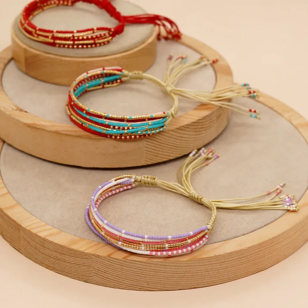 

Beaded bracelet Multilayer Splicing Retro Tidal current Bohemia Adjustable Hand weaving Rice bead bracelet