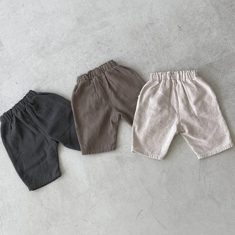 Description Picture 3 of item2025 Summer New Baby Solid Color Shorts Loose Children Casual Pants Fashion Boys Girls Cotton Shorts Infant Clothes