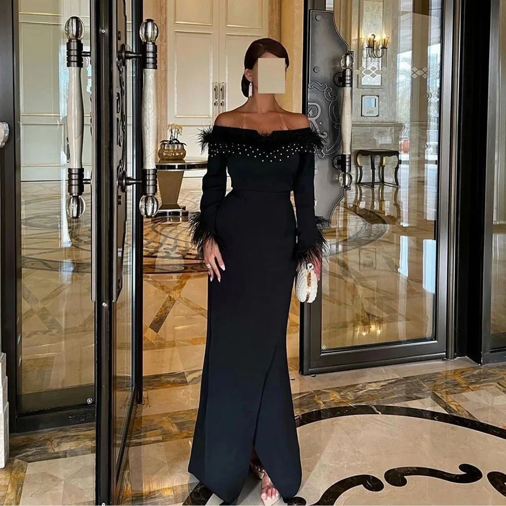 

Saudi Arabia Black Mermaid Evening Dresses Off Shoulder Feathers Beaded Long Sleeves Prom Party Gowns With Side Slit فساتين سهره