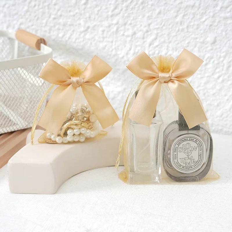 50 teile/los Bowknot Organza Geschenk Tasche Mehrfarbige Kordelzug Weihnachten Hochzeit Süßigkeiten Geschenk Tasche Kosmetik Parfüm Exquisite Verpackung