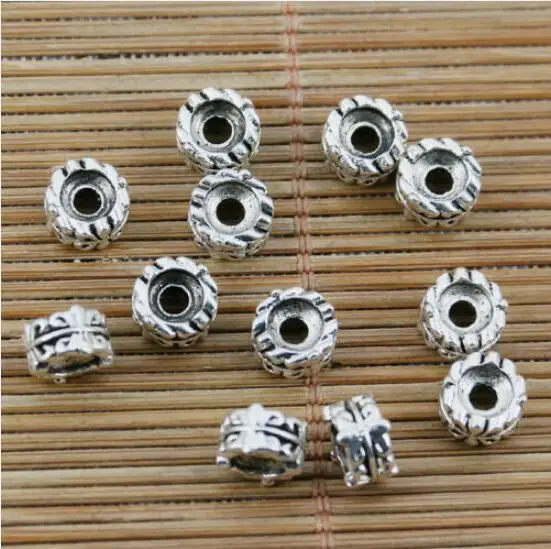 

40pcs 7.4*4.7mm hole 2.3mm tibetan silver color round pattern spacer bead EF2291