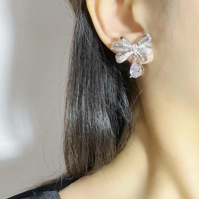 2023 Women Brilliant Bow Tie Earrings Plated 18K Gold Exquisite Water Drops Exaggerate Necklace Ring 2