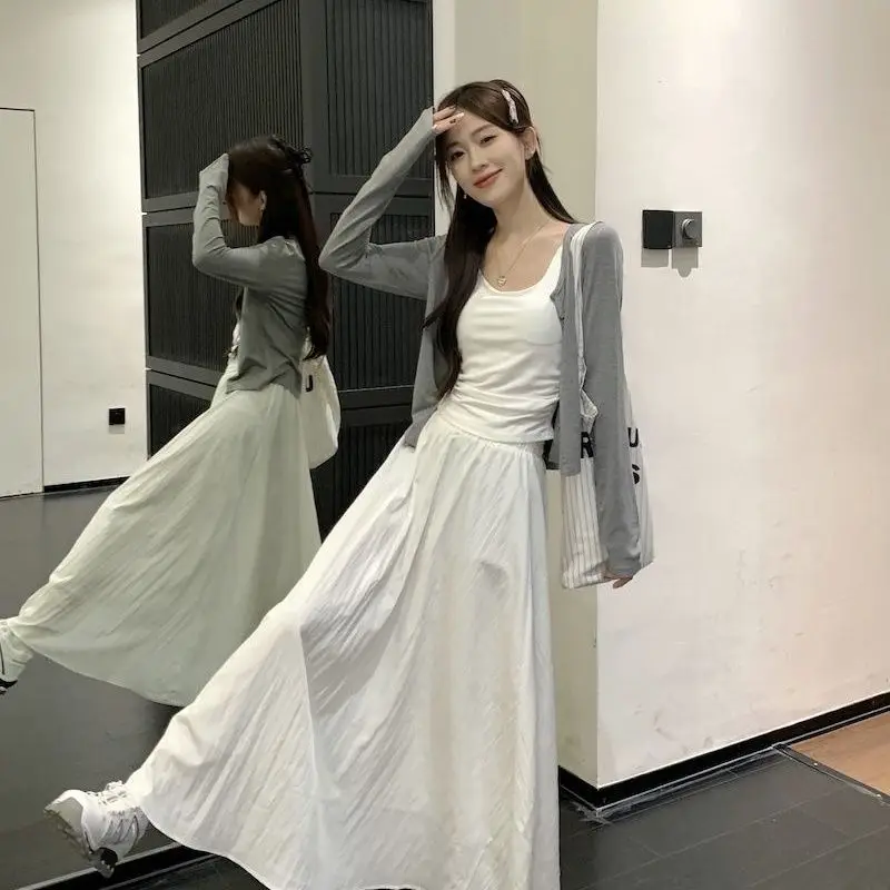 Korean Style Long Sleeved Cardigan with Bottom Suspender Vest, White Long Skirt, 2024 New Fashionable Women's Three Piece Set