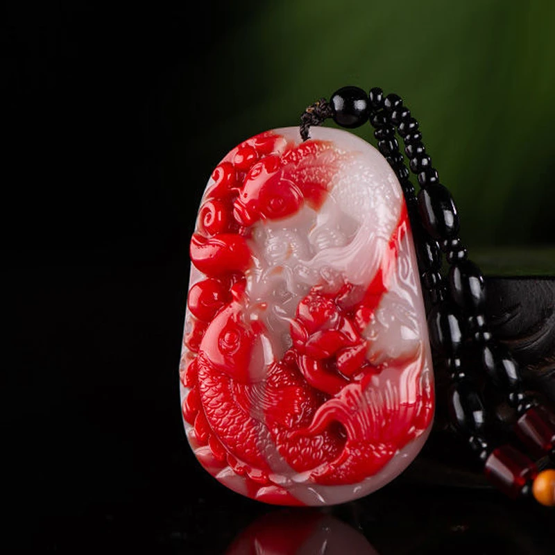

Chicken Blood Jade Double Fish Playing Lotus Pendant for Men and Women with Annual Surplus Gold and Jade Full of Fashion Pendant