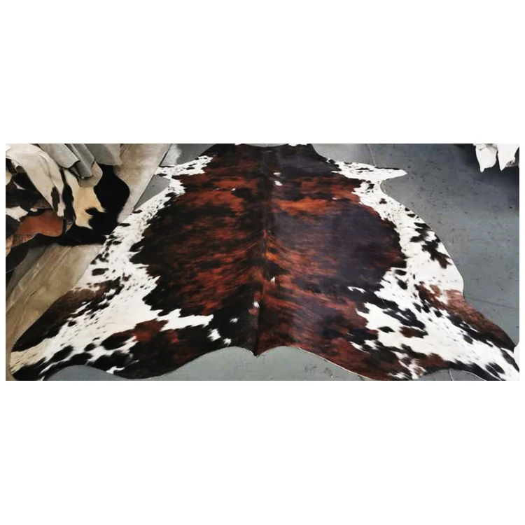 cowleathercarpetnaturalcowhiderugcowskincolourfulrug.jpg