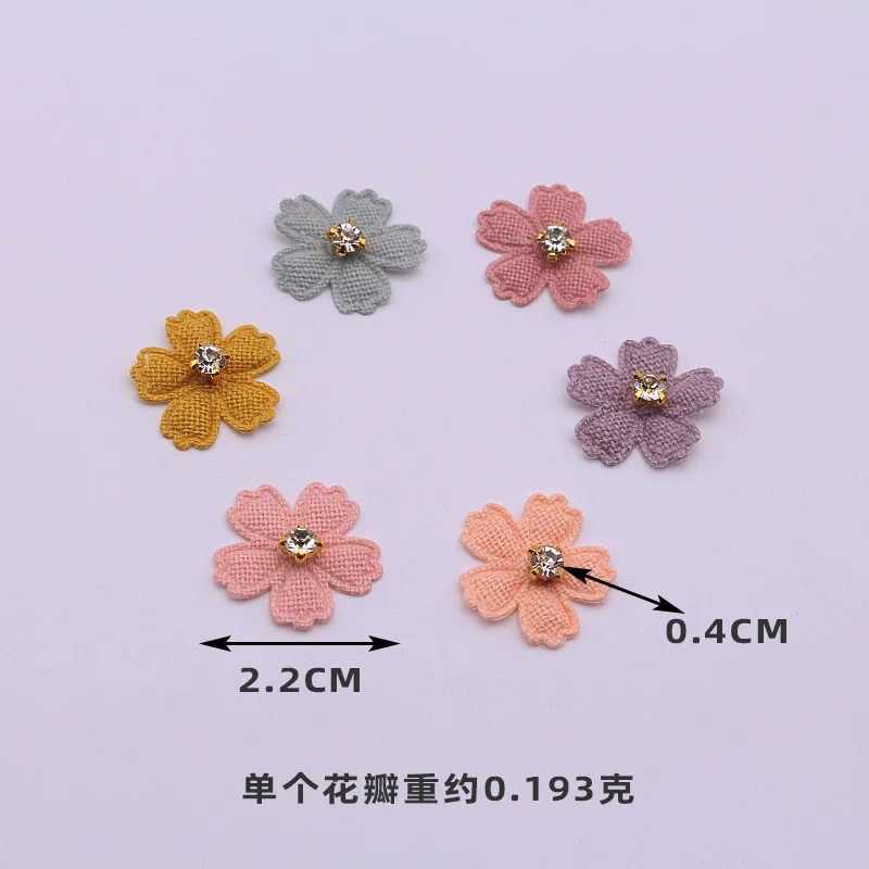 A set of 20 small fabric flower patches, perfect for use in projects, hair accessories, headbands, bows, and hat dec