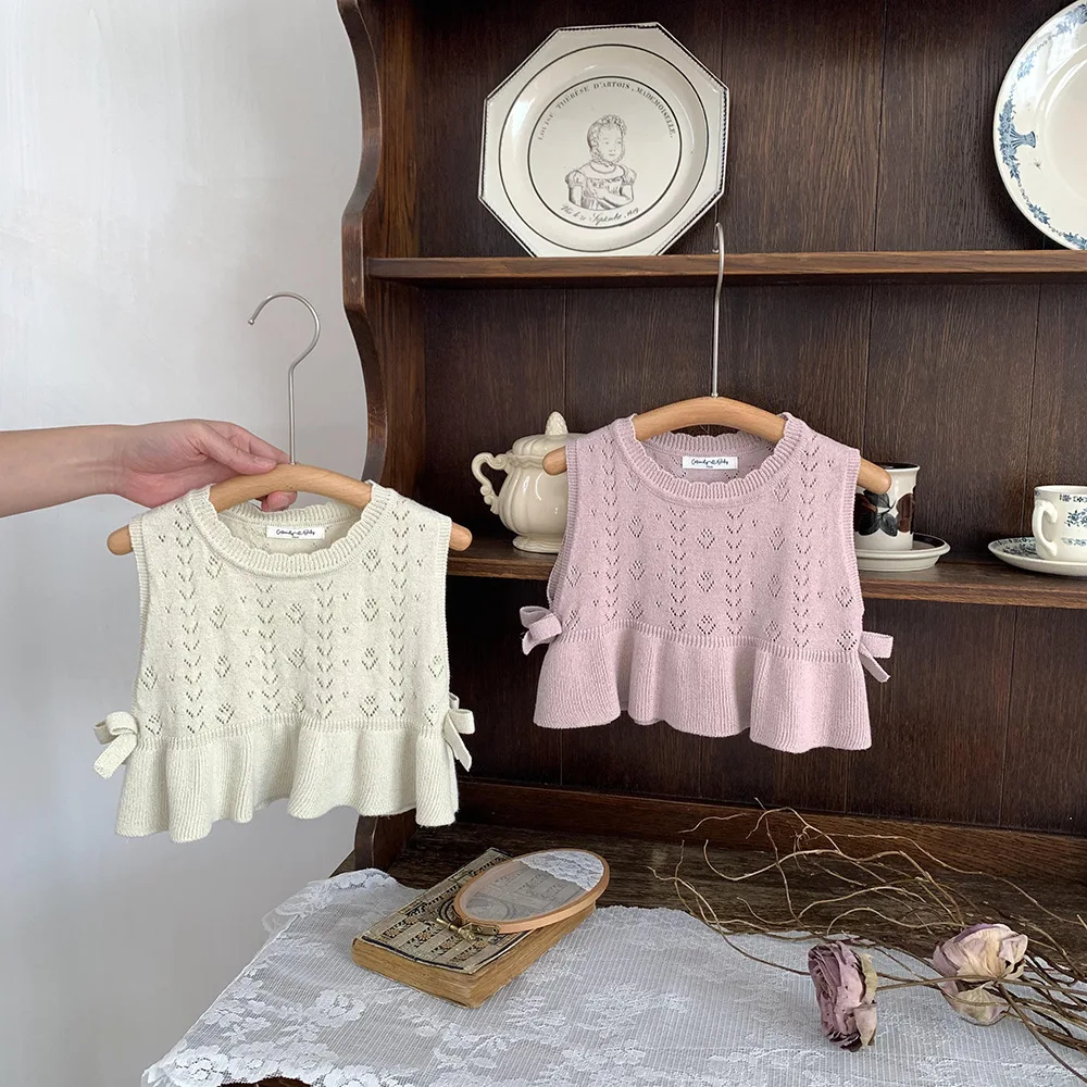 

Вязаные жилеты для маленьких девочек, пуловеры без рукавов в Корейском стиле, топы, Детские однотонные хлопковые безрукавки, Свитера с вырезами и бантом, весна-лето