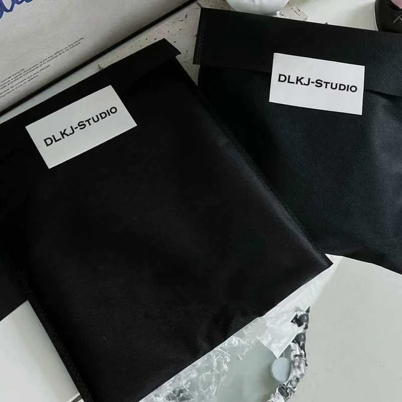 50pcs Thickened Non-woven Fabric Bag With Handle Large Capacity T-shirt Packaging Clothing Store Special Gift Bag 2