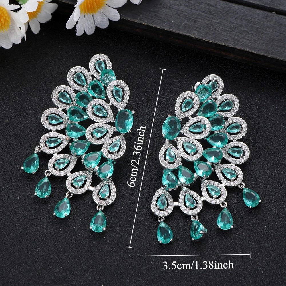 زوج واحد من أقراط متدلية على شكل طاووس كريستال زمر...