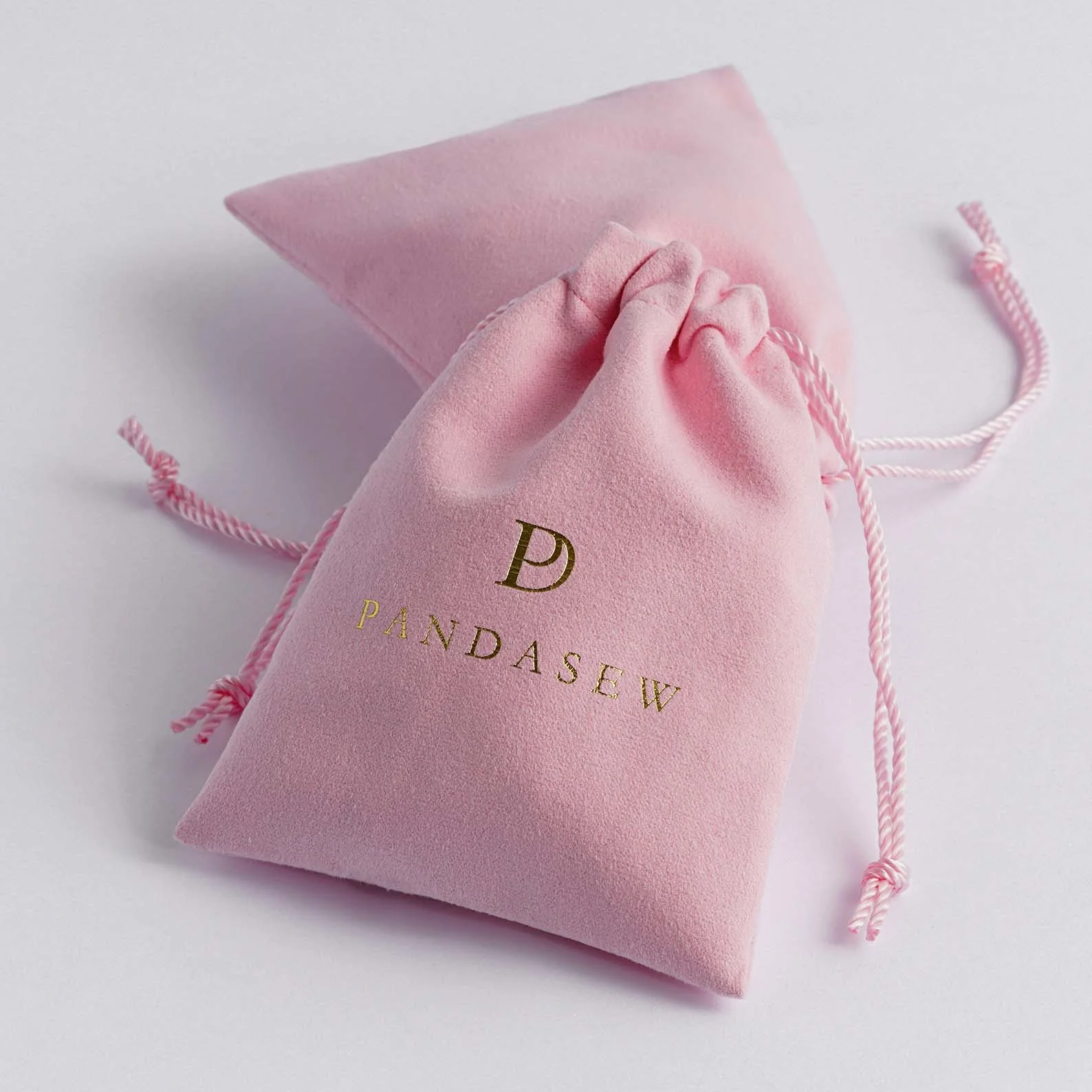 50pcs-custom-logo-pink-gift-package-velvet-suede-drawstring-bag-for-jewelry-pouch