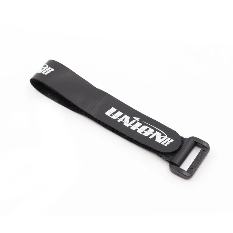 Sangle de batterie antidérapante en silicone installée sur un drone FPV, prête pour le vol.