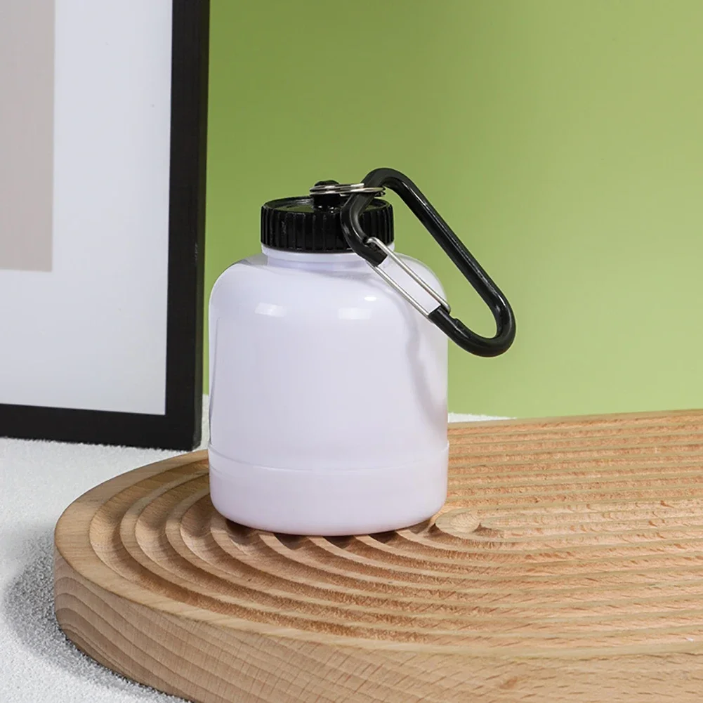 Compact Multi-Purpose Travel Bottle with Keychain Funnel and Storage Compartment
