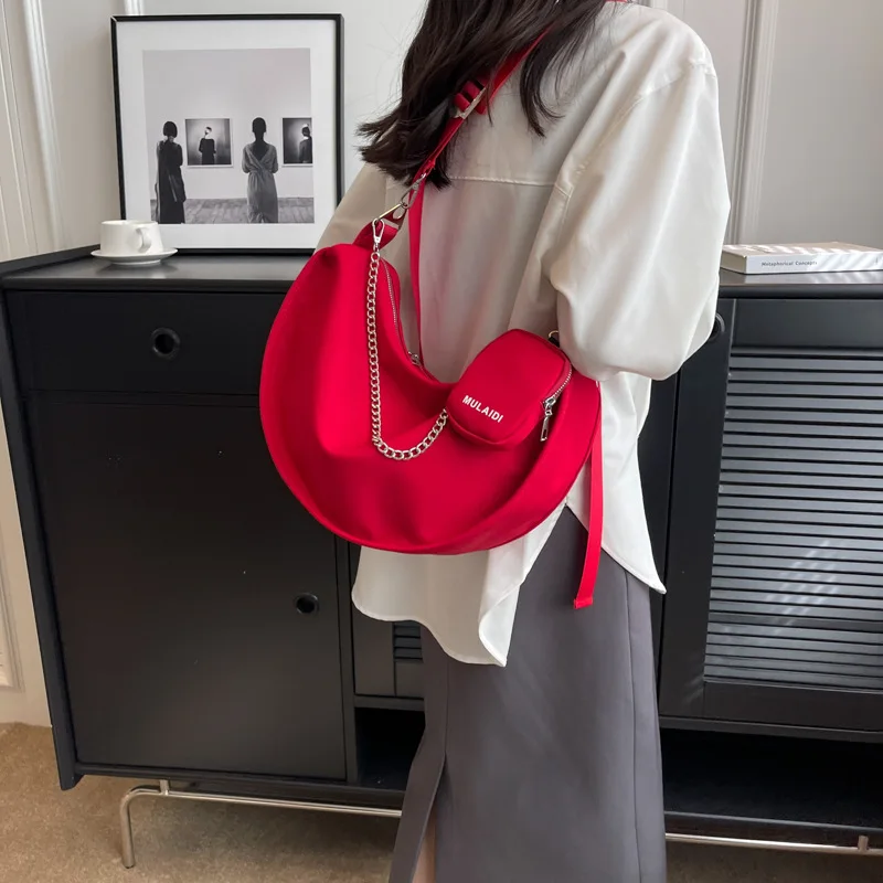 

Canvas bag women's summer Joker 2023 new large-capacity one-shoulder red messenger bag niche simple jiaozi bag