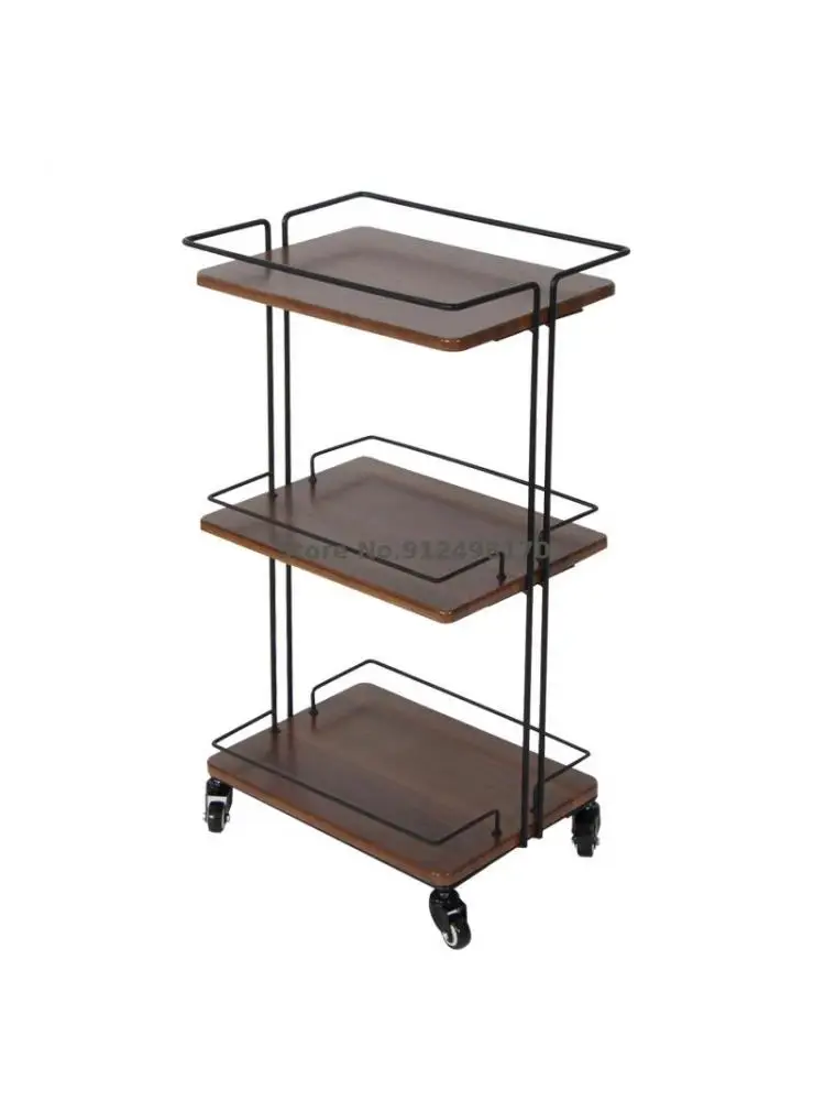 A few corners on the side of a Japanese sofa, a movable iron dining car, multi-layer rack, kitchen storage rack, living