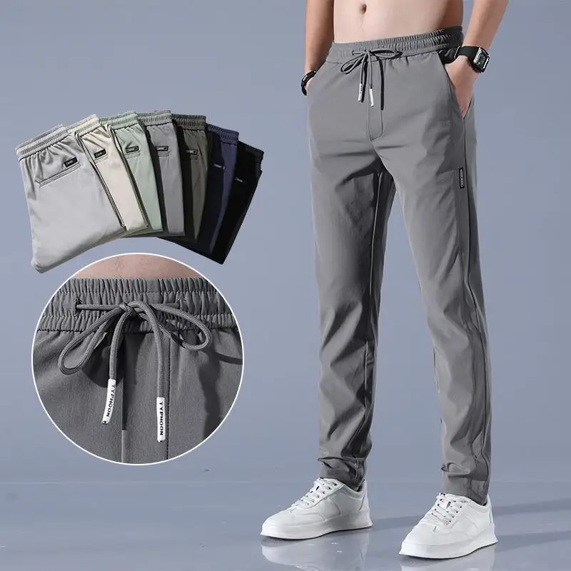 2024 Summer Ice Silk Thin Sports Pants Men's Straight Loose Elastic Non ironing Casual Pants Men's Work Wear Pants