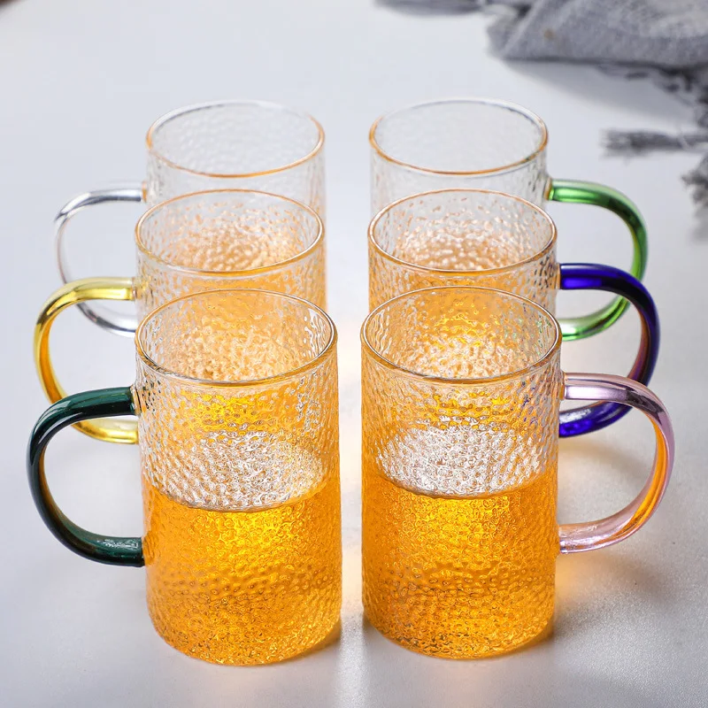 https://ae01.alicdn.com/kf/Sc067b2cad2cb40f8b863daeb121f3af2D/Color-Handle-Coffee-Mugs-With-Hammered-Texture-Heat-resistand-Moet-Glass-Cup-For-Beer-Tea-Milk.jpg