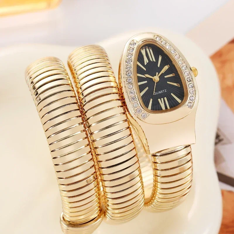 Serpentine Womens Quartz Watch: Diamond Inlaid Wrist