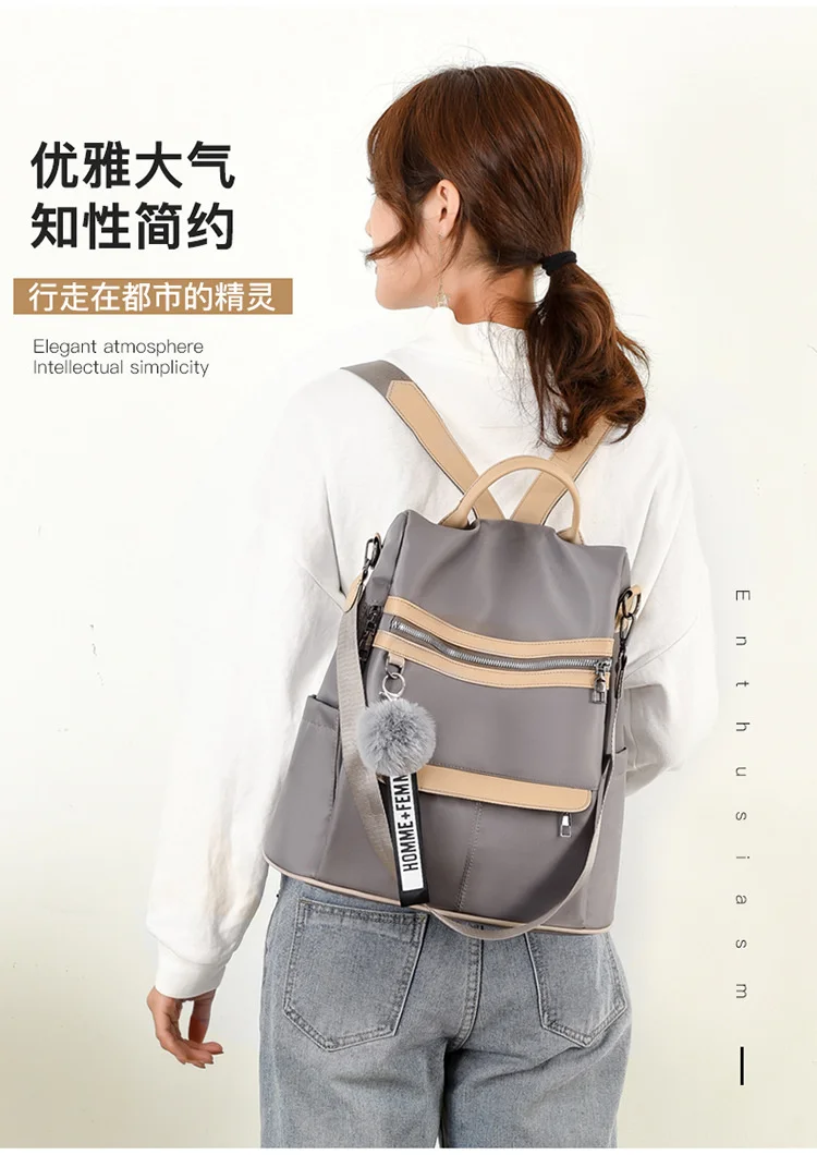 2021 New Backpacks for women Waterproof Anti-theft Oxford Cloth School Bags Simple College Wind Bags Hair Ball Pendant GE11