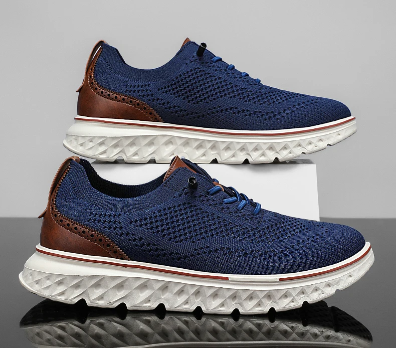 Pair of brown mesh sneakers with soft soles placed on a concrete surface, highlighting breathable texture and sporty silhouette 45787