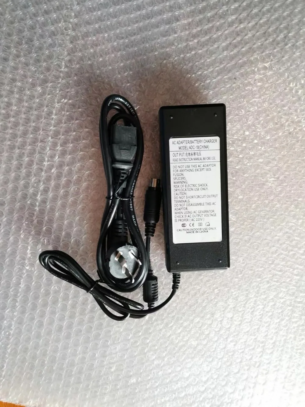 

Free Shipping BTR-09 Battery Charger ADC-18 For FSM 70S 70S+ 80S 61S 62S Optical Fiber Fusion Splicer AC Power Adapter