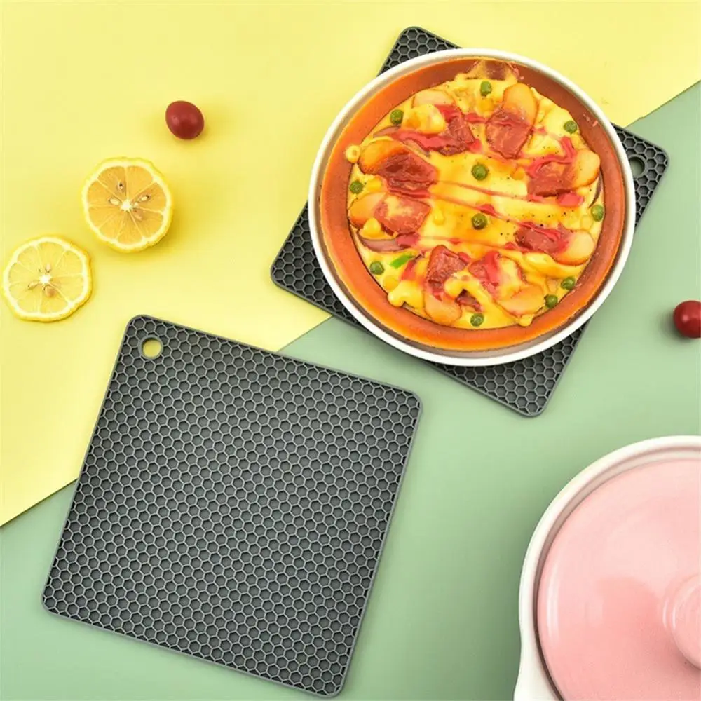 https://ae01.alicdn.com/kf/Sc08ddefde2bc45dfa92ad4aa28bda9c5v/1-5PCS-Multipurpose-Silicone-Trivet-Mat-for-Hot-Pots-and-Pans-Non-Slip-Heat-Resistant-Silicone.jpg