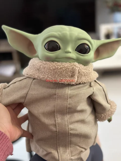 Peluche L’Enfant de ​Star Wars, jouet avec mouvements et sons, figurine de  bébé Yoda de la série «The Mandalorian» («Le Mandalorien»)