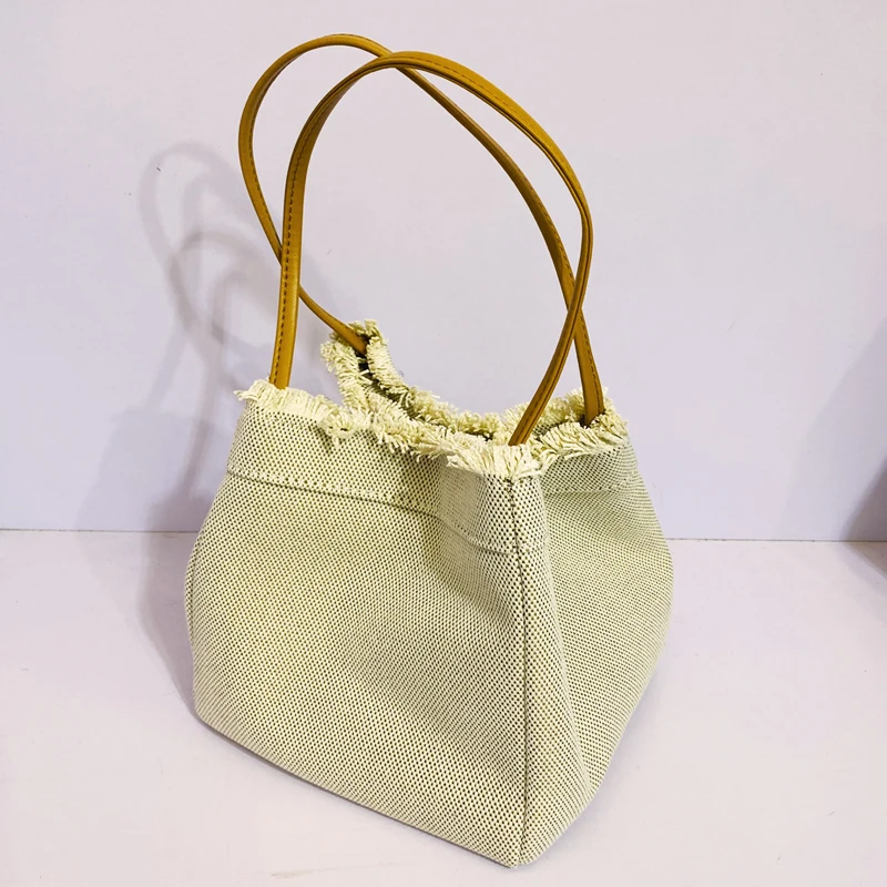 Mini bolsos de mezclilla para mujer, bolsos y carteras de diseñador de lujo, novedad de 2023, bolso de hombro de tela con borlas y remaches