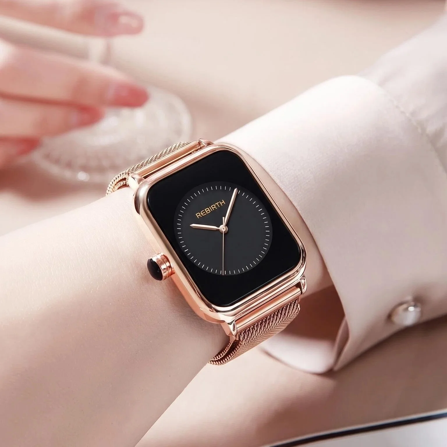 Elegant Rose Gold Women's Watch with Black Dial and Gemstone Crown