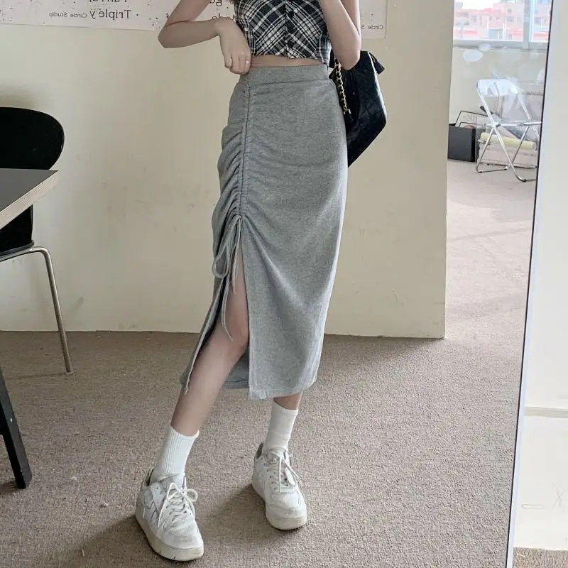 

Large size for women, niche package, hip half skirt, women's design sense, solid color drawstring pleated split skirt, 150KG