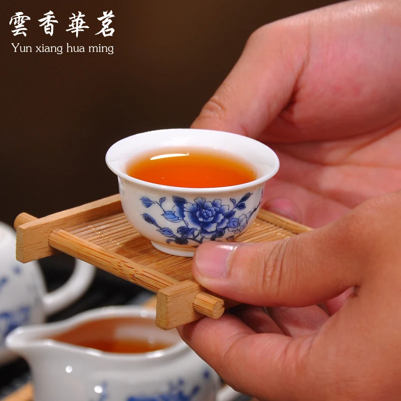 Kung fu tea set the whole kettle set of blue and white porcelain ceramic teapot solid wood tea tray ceremony tea cup tea ceremony tools tea set