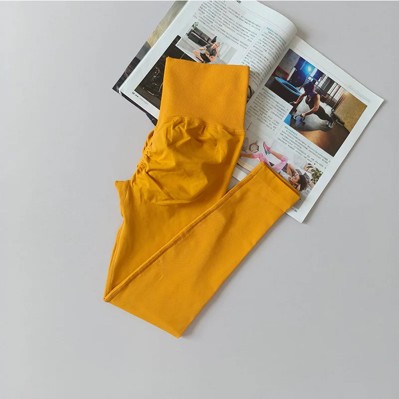 بنطلون رياضي نسائي بدون خياطة بخصر عالٍ ورفع للأرداف، بنطلون خوخي الشكل للجري والتمارين واليوغا، ليجنز ضيق للنساء