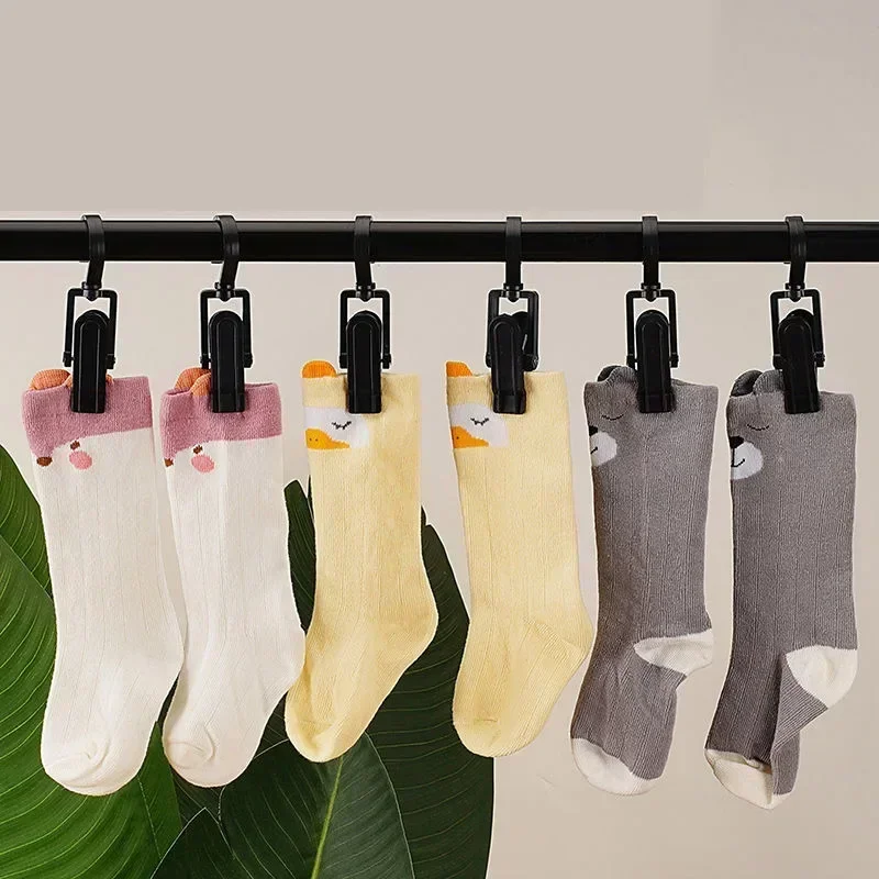 Description Picture 4 of item5/10/20PCS Rotating Clothespins Clamps Hanging Clothes Pegs Hooks Laundry Rotate Hat Clothespin Clamps for Home Storage Hangers