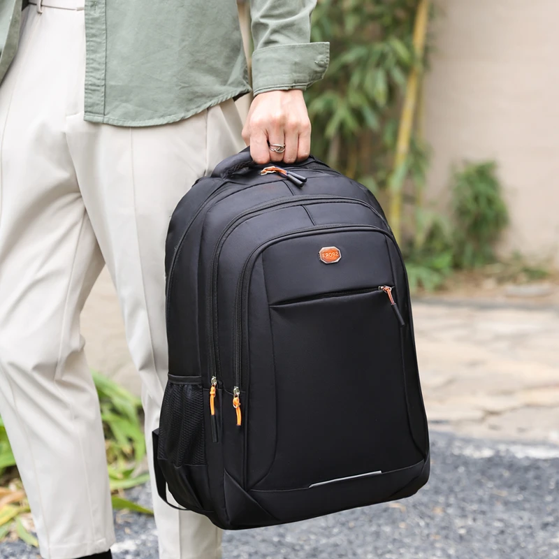 The large-capacity backpack, equipped with multiple zippered pockets and durable shoulder straps, is an ideal choice for travel,