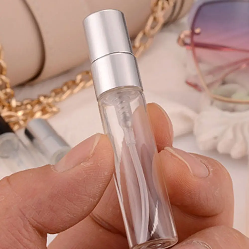 10ml perfume bottle in hand