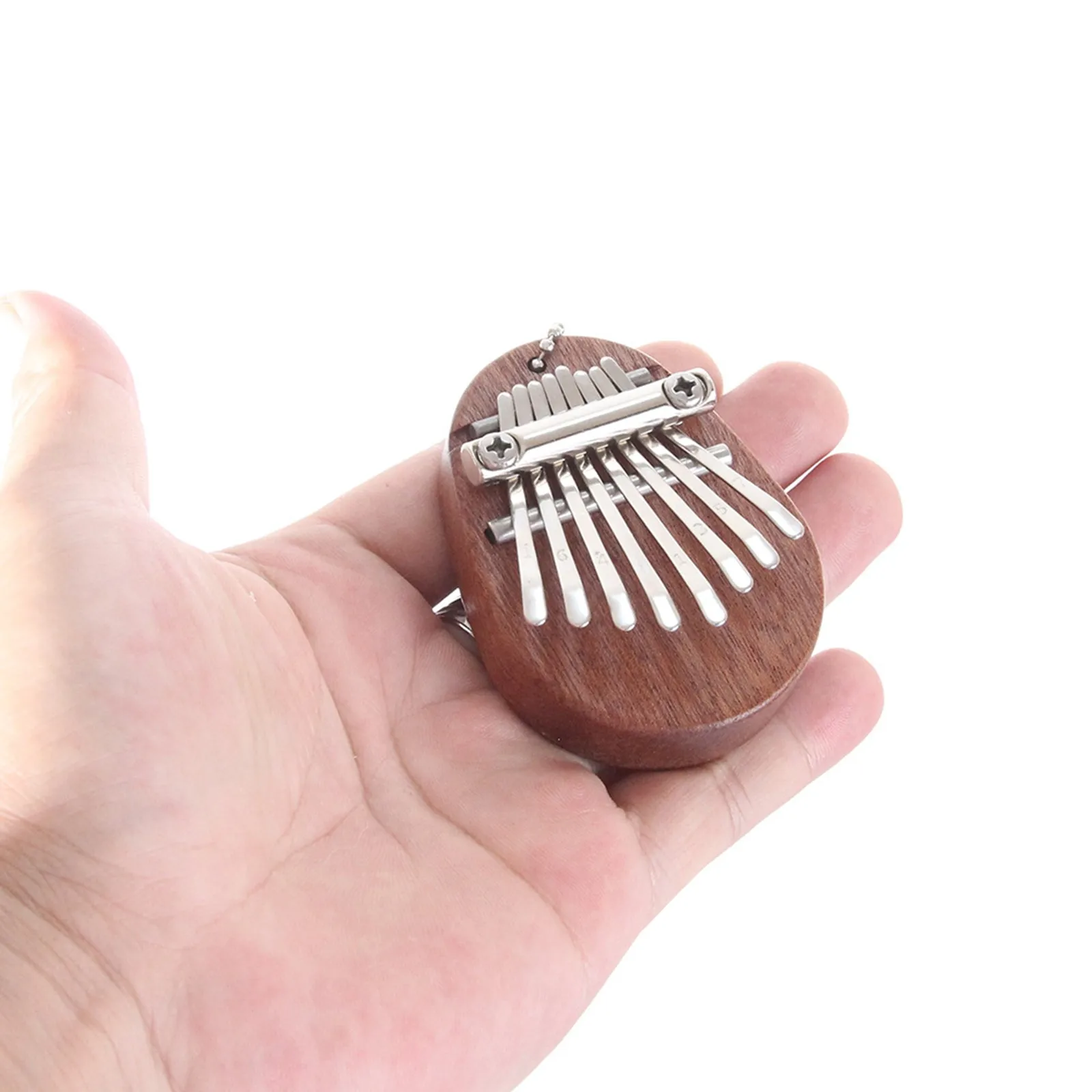 Description Picture 6 of itemThumb Piano 8 Key Mini Kalimba Exquisite Finger Piano Portable Marimba Musical Pendant Gift 8 Key Keyboard Musical Instrument