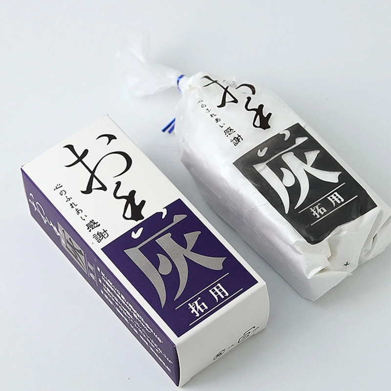 Opened package of white incense ash for burners