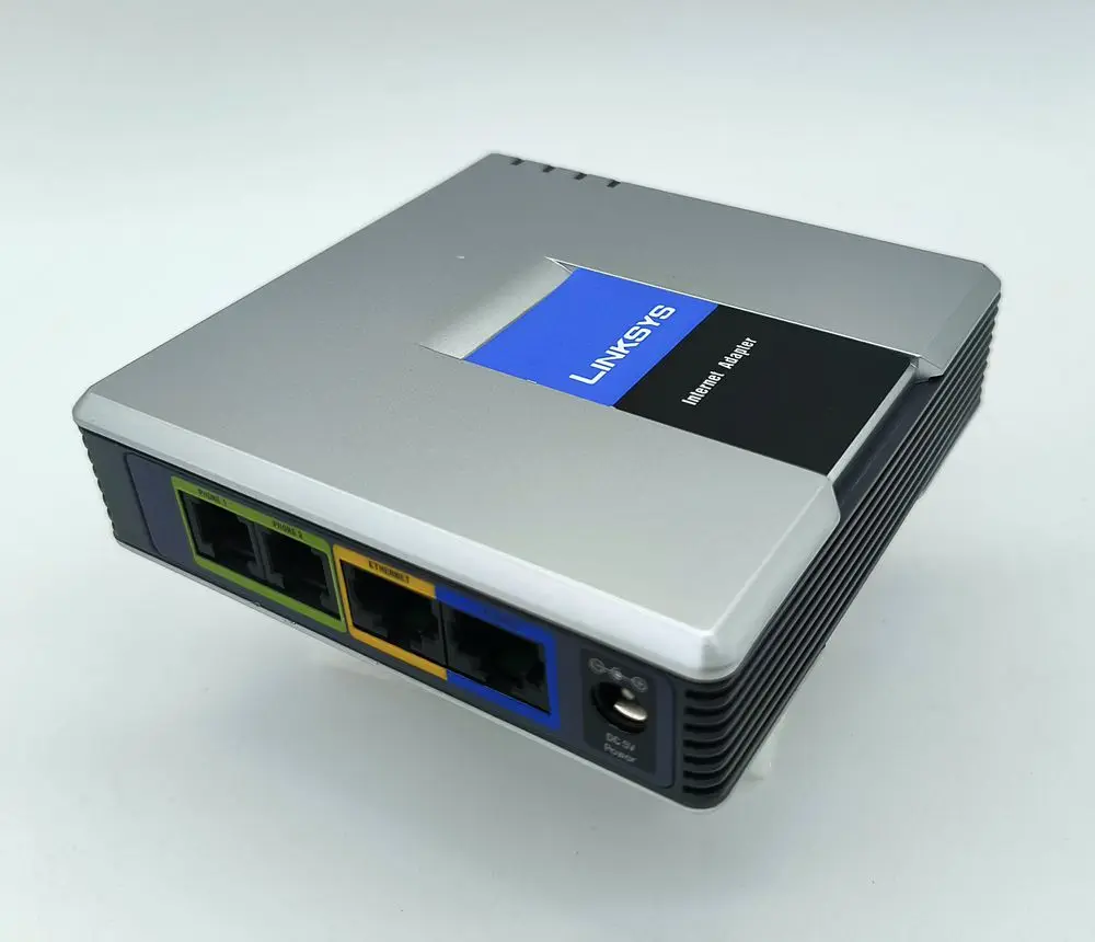 

Новый разблокированный SIP VoIP-адаптер для телефона SPA2102