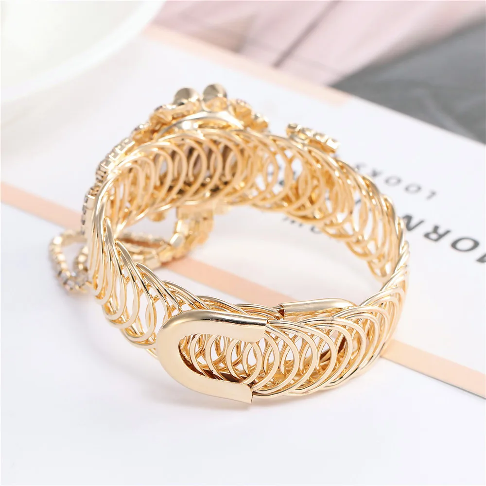 YIKAZE Luxury Women's Watches Gold Bangle Quartz Watch Hollow out Diamond Alloy Strap Ladies Bracelet Dress Wristwatch Clock 6