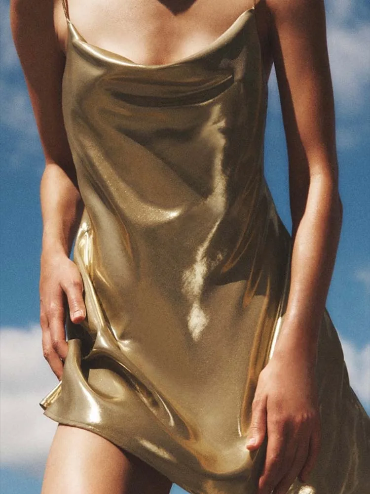 

Autumn new women's fashion European and American sexy and stylish slim-fitting bright metallic mini dress
