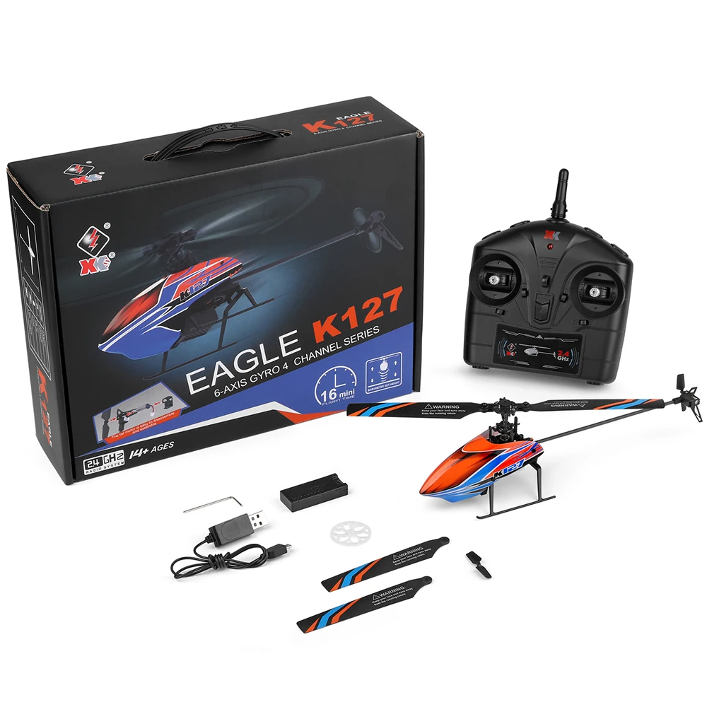 Hélicoptère RC WLtoys K127 posé sur une surface, avec son châssis léger et son gyroscope 6 axes