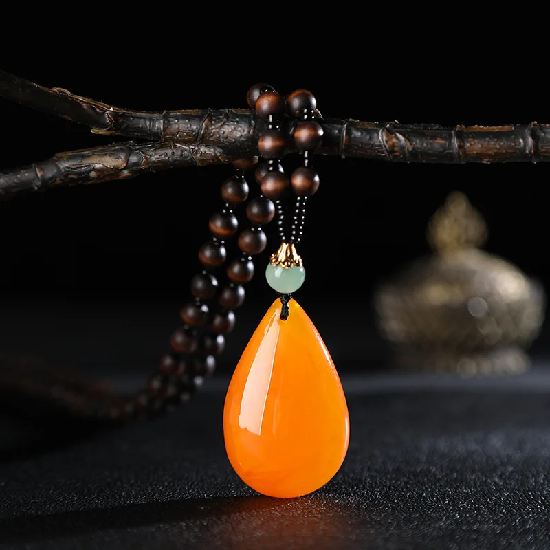 Imitation beeswax water drop necklace nuclear wood beads long sweater chain women's imitation amber pendant