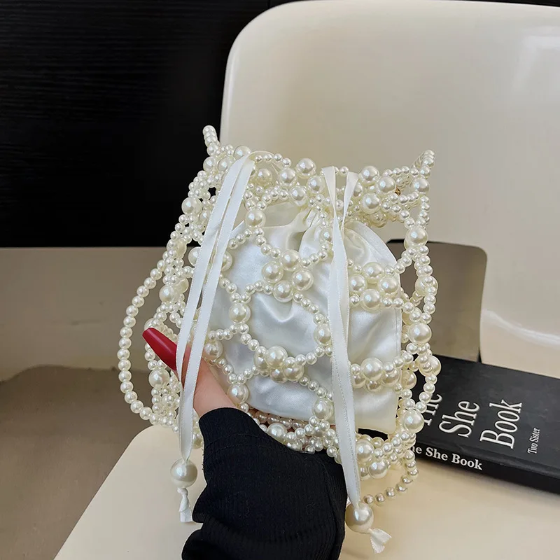 Summer New Hollow Pearl Handheld Womens Bag Diy Handmade Beaded Handheld Bag Small Mini Phone Bag New