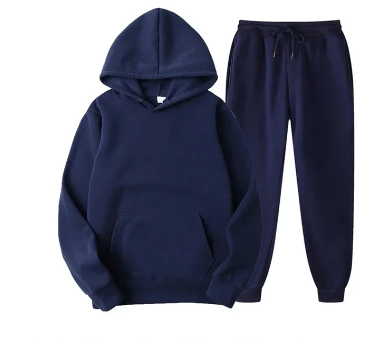 Woman wearing matching hoodie and sweatpants set in a cozy autumn outdoor setting dark blue