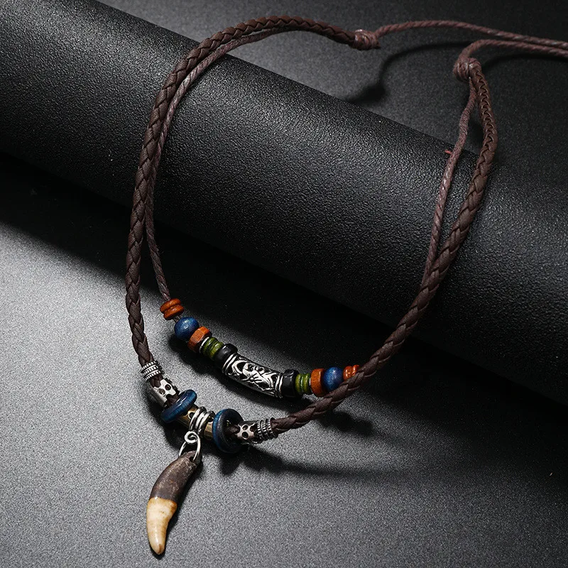 LETAPI Punk Vintage Wolf Tooth Pendant Necklace for Men Women Leather Beaded Weaved Ethnic Style Jewelry Gifts Fang Tooth Necklace