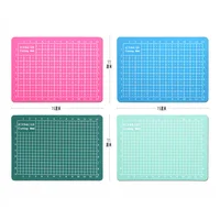 4 colorxiehaige 15*11Double-Sided PVC A6 Cutting Mat Multipurpose Self Healing Cutting Mats for Durable Paper Mat for Cutting 1