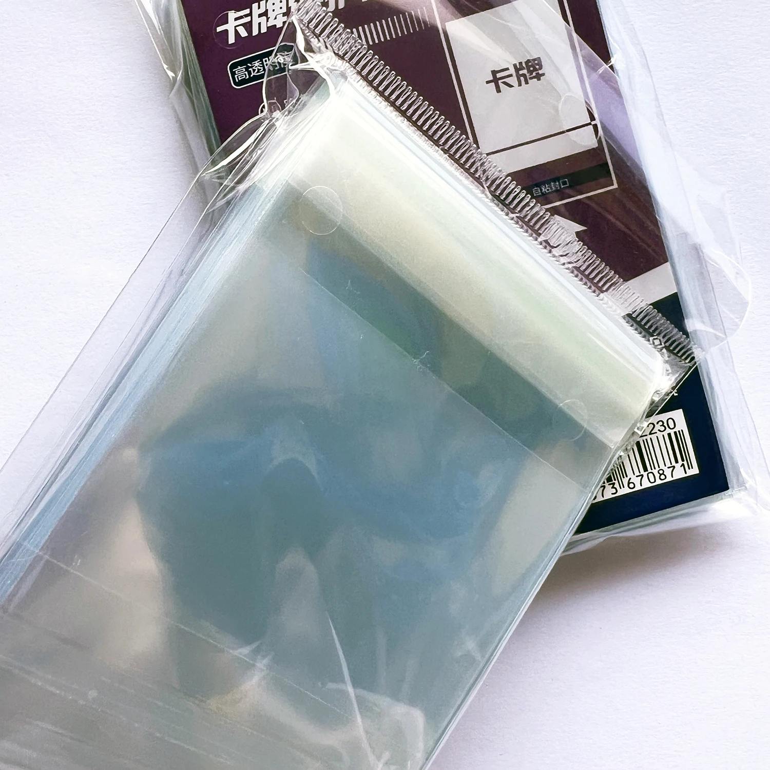 100ct HENWEI 64.5X89mm High Quality Clear Card Sleeves Sealed Sports Card Protector For 63X88mm Size Acidfree NOPVC Cover