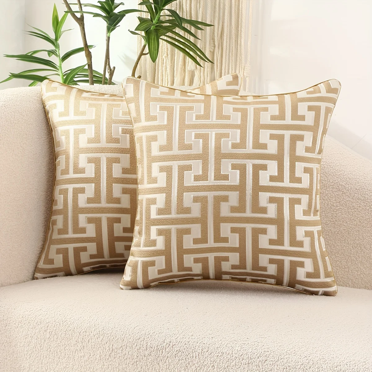 Khaki geometric jacquard pillow covers styled on a sofa