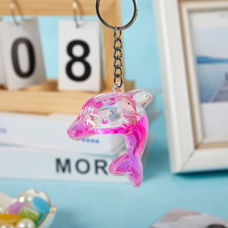 女性のための液体キーホルダー,透明なイルカの形をした